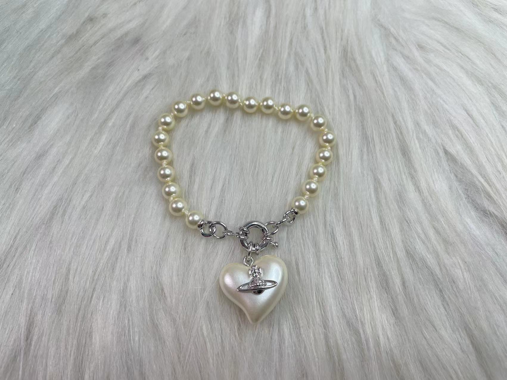 NO:103100,P80. 20 Spring and Summer 24 Queen Mother Saturn Love Water Drop Pearl Bracelet in White Gold, Queen Mother, Bracelet, gold19860909P80. 20 24春夏 西太后土星爱心水滴珍珠手链一白金色黄金色,西太后手链,bracelet,gold,Jewelry