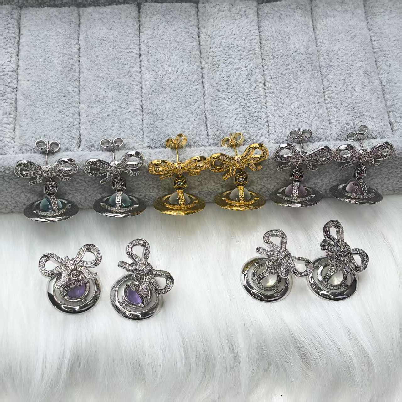 NO:104561,Collection of collection of Queen Mother-in-Civilian's popular OCAVIE bow three-dimensional Saturn necklace earring bracelet, Queen Mother-in-Civilian earrings, earrings, necklace, bracelet19860909西太后薇薇安爆款OCAVIE蝴蝶结立体土星项链耳环手链集合图,西太后耳钉,earrings,necklace,bracelet,Jewelry