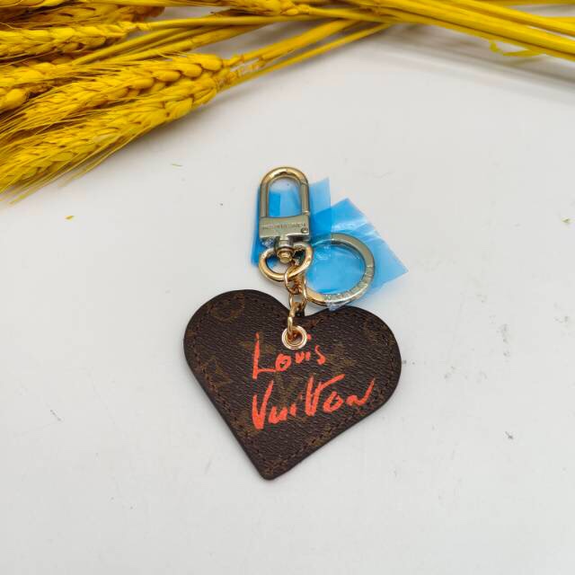 Close-up of peach heart keychain