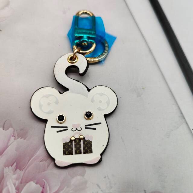 Close-up of mouse keychain leather