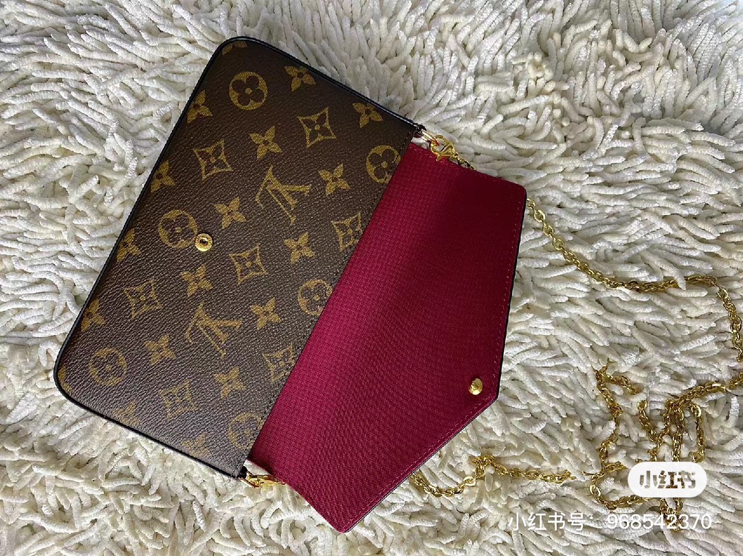 Detailed view of the coin purse feature inside the wallet set.