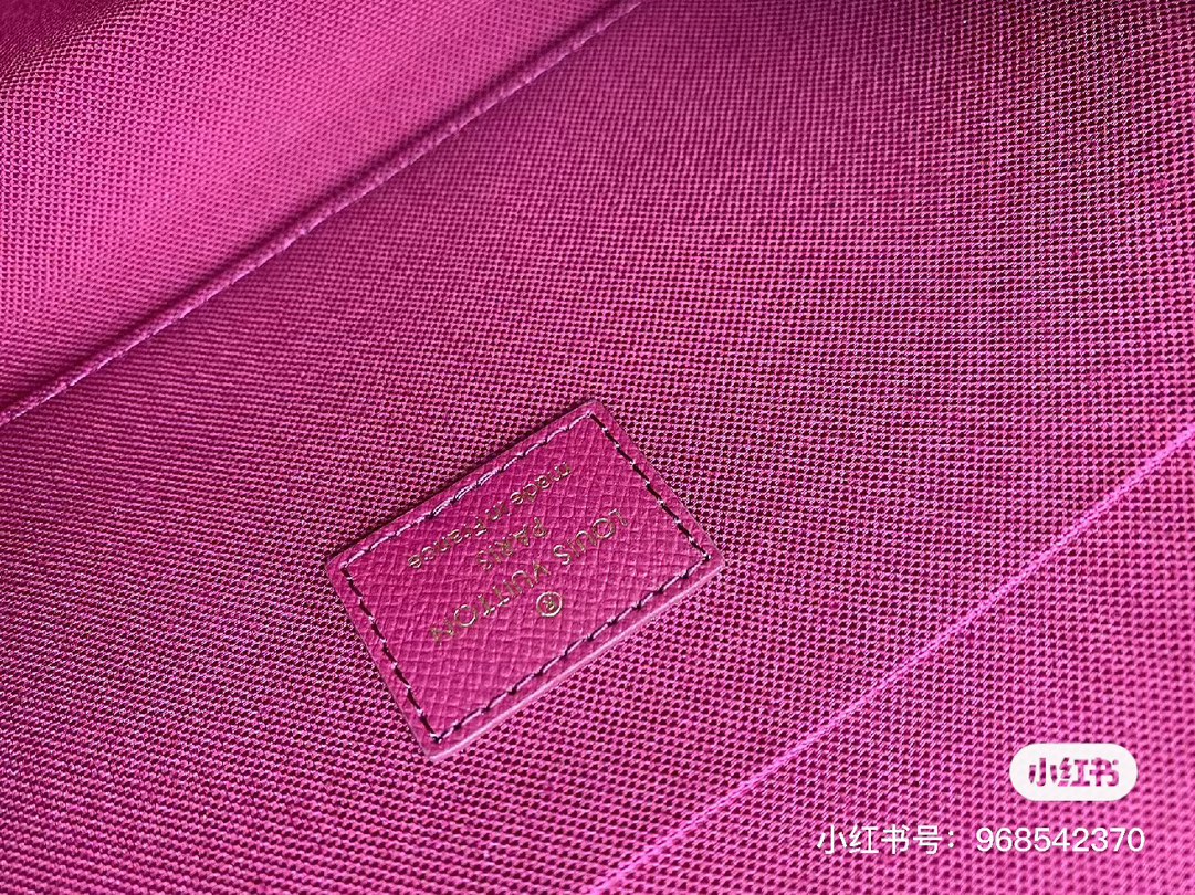 A person touching and checking the quality of the leather wallet