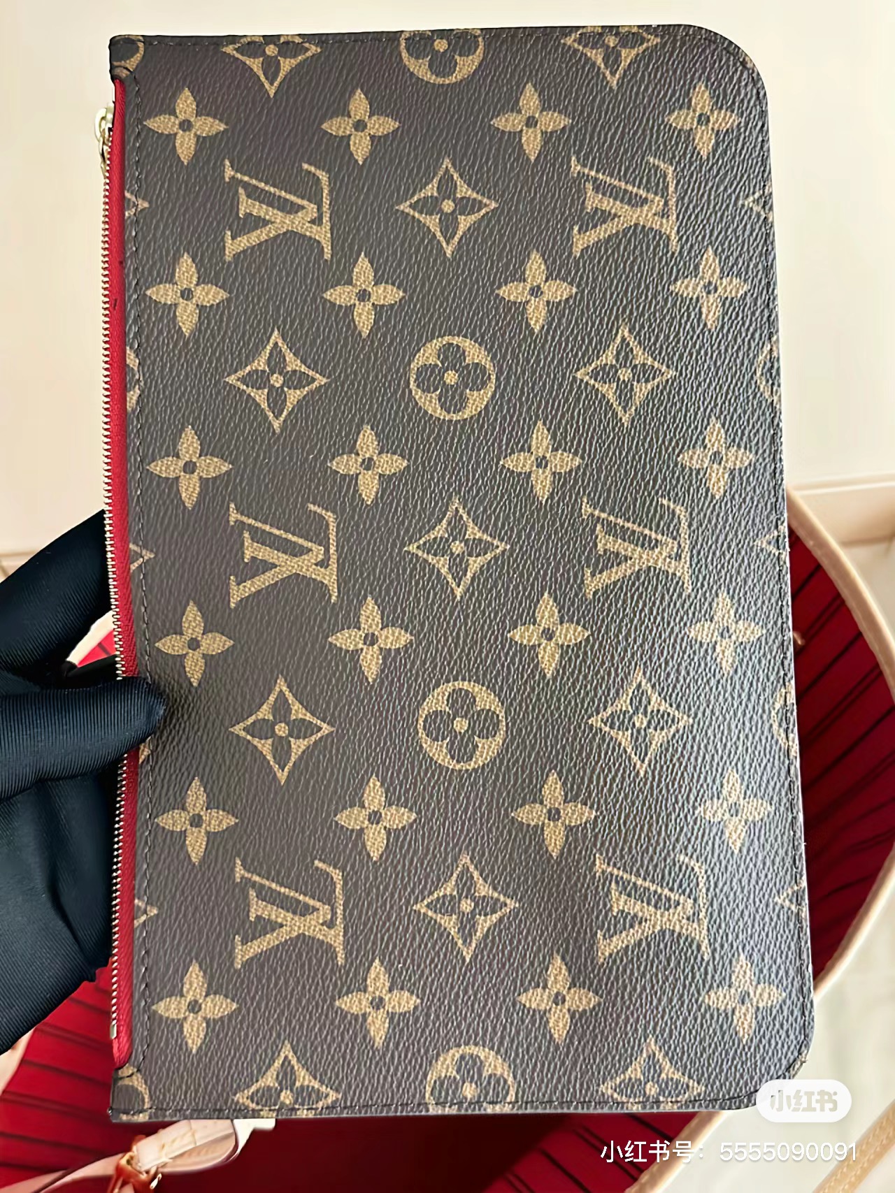 Model carrying the classic leather crossbody bag