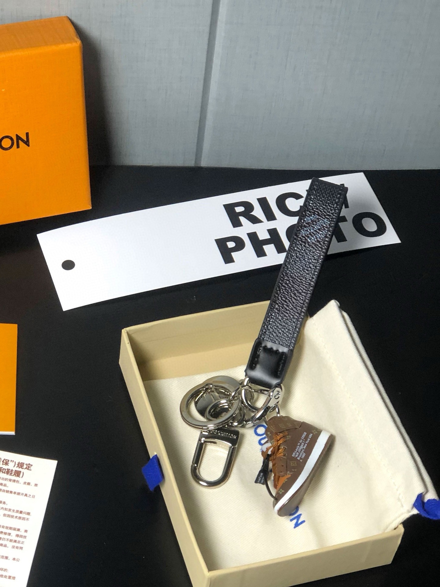 LV Nike Keychain on bag