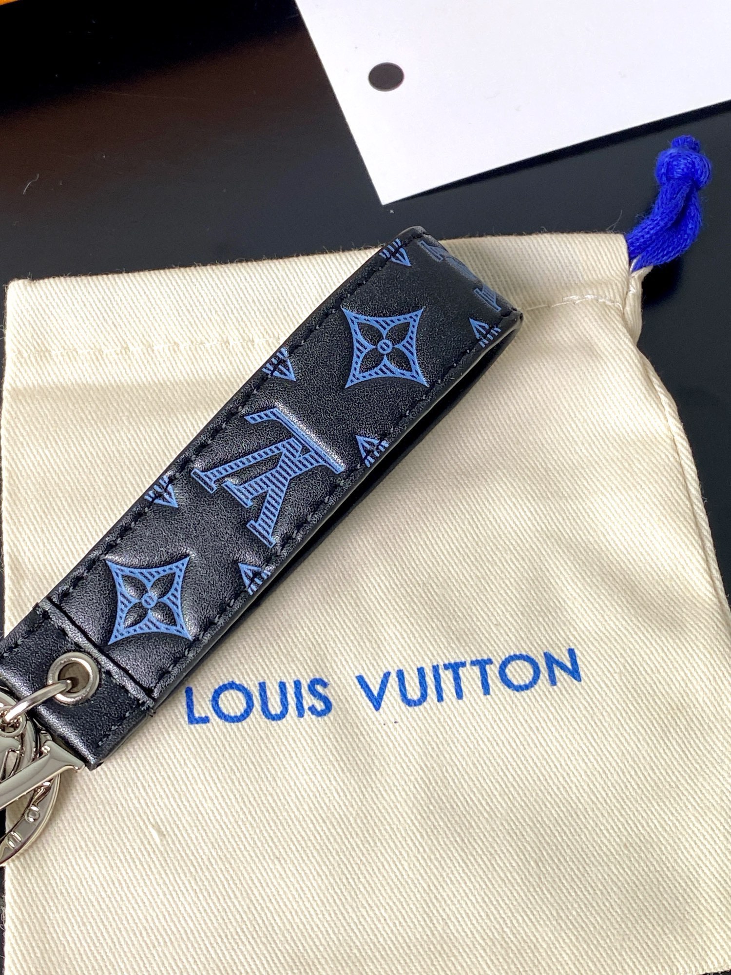 Textured leather keychain detail