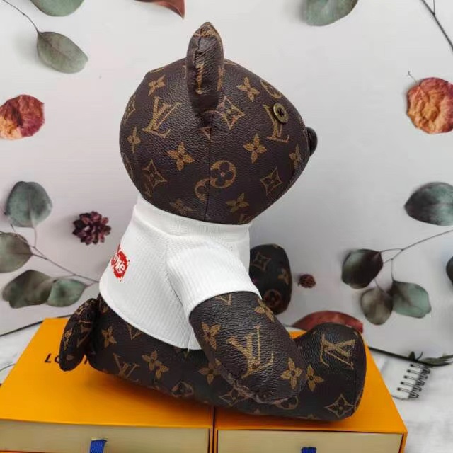 Close up of bulldog doll face on handbag