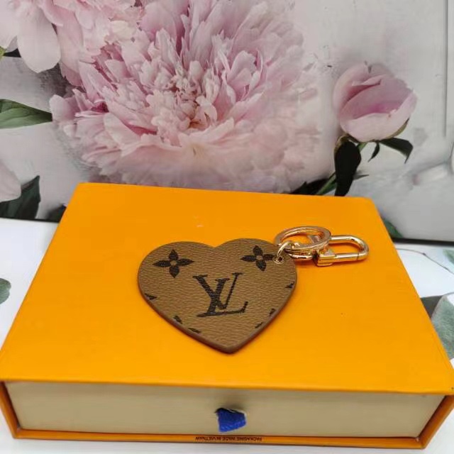 Side view of heart-shaped leather keychain