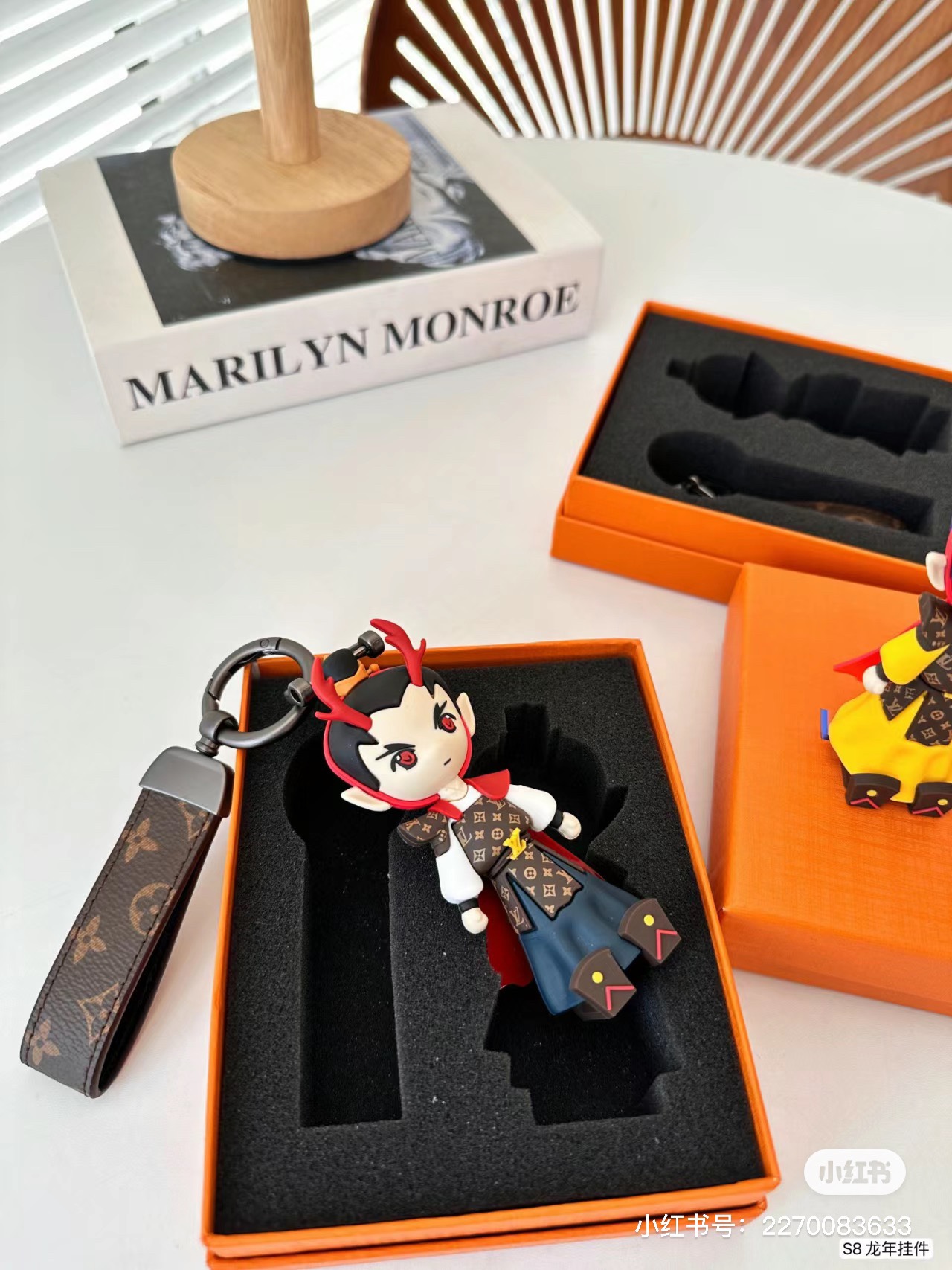 Collection of various colored dragon keychains