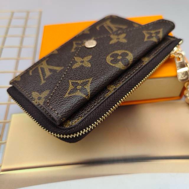 Close up of three leather card holders in different colors