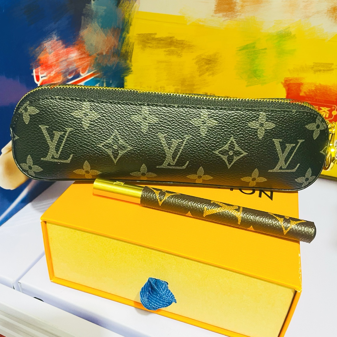 Mini Leather Top Handle Bag - Model with Bag Model wearing the mini leather top handle bag