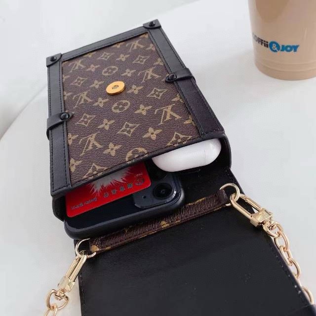 Chain phone bag worn as a crossbody, showing how it looks when worn.