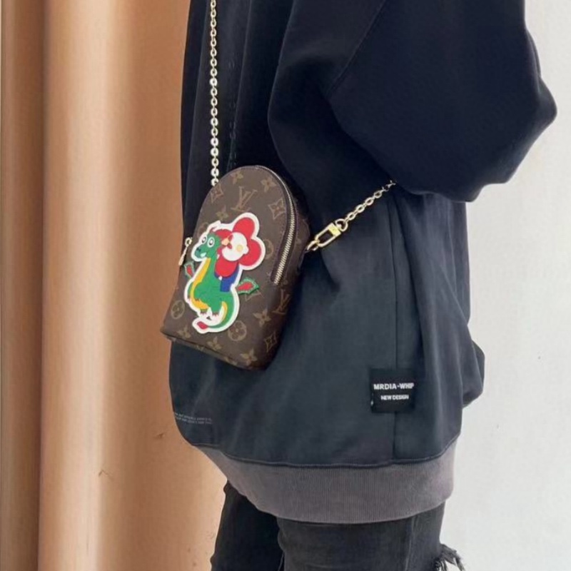 Green Dragon Leather Crossbody Bag chain strap detail