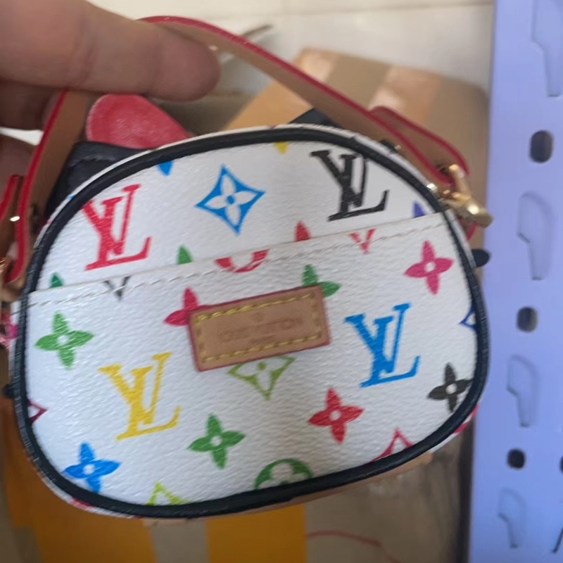 Close up view of the design on the floral kt cat handbag