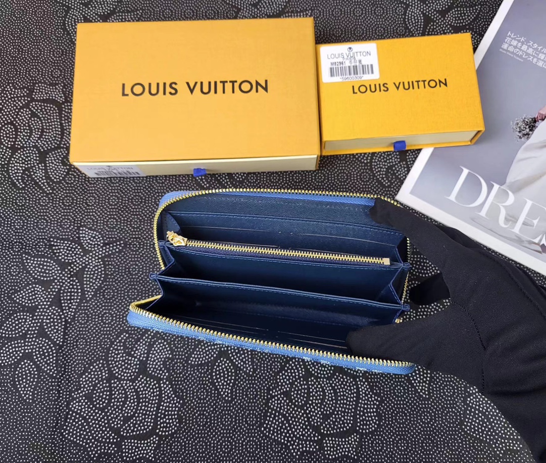 Open view of the leather bifold wallet revealing card slots