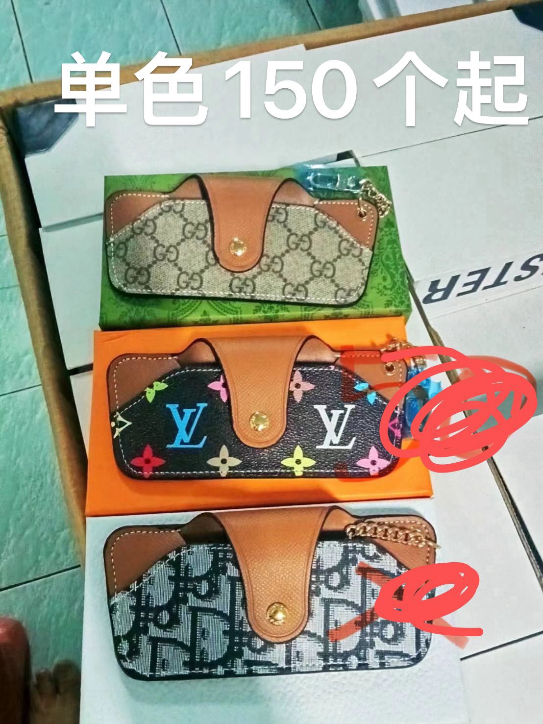 Person putting eyeglasses in leather case