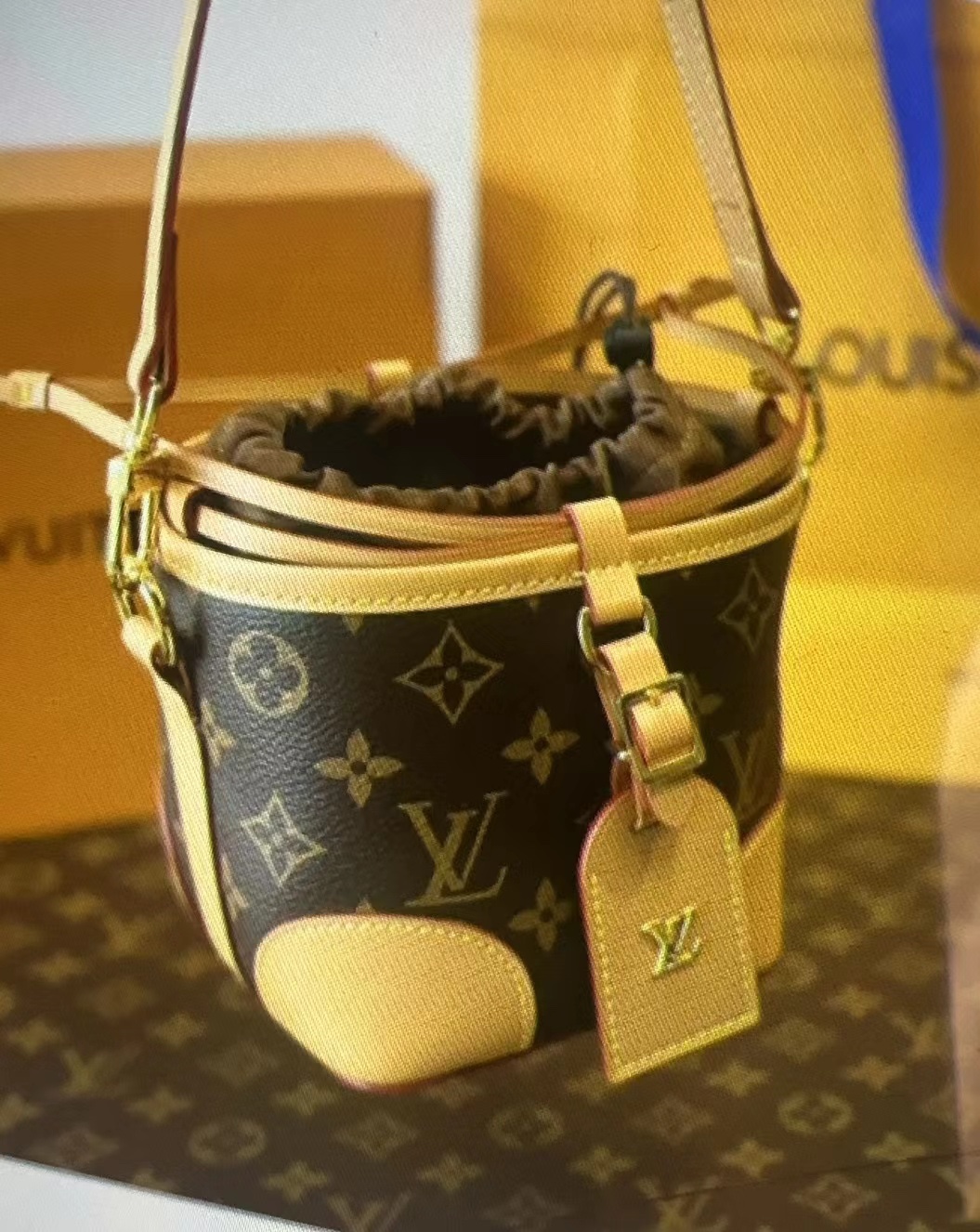 Textured leather crossbody bag front view