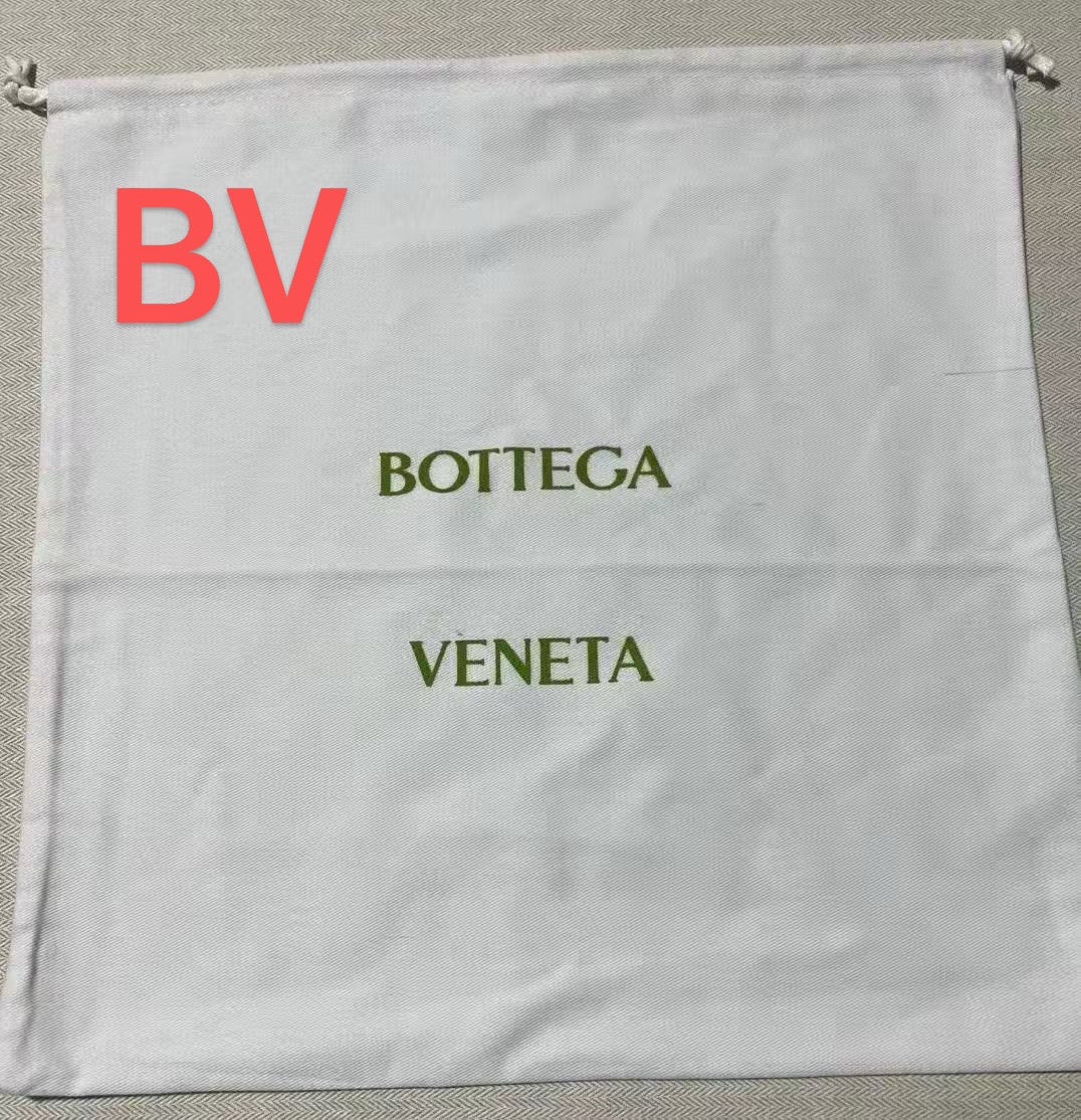 Dust Bag - Showcasing a Crossbody in a Dust Bag A crossbody handbag in a dust bag