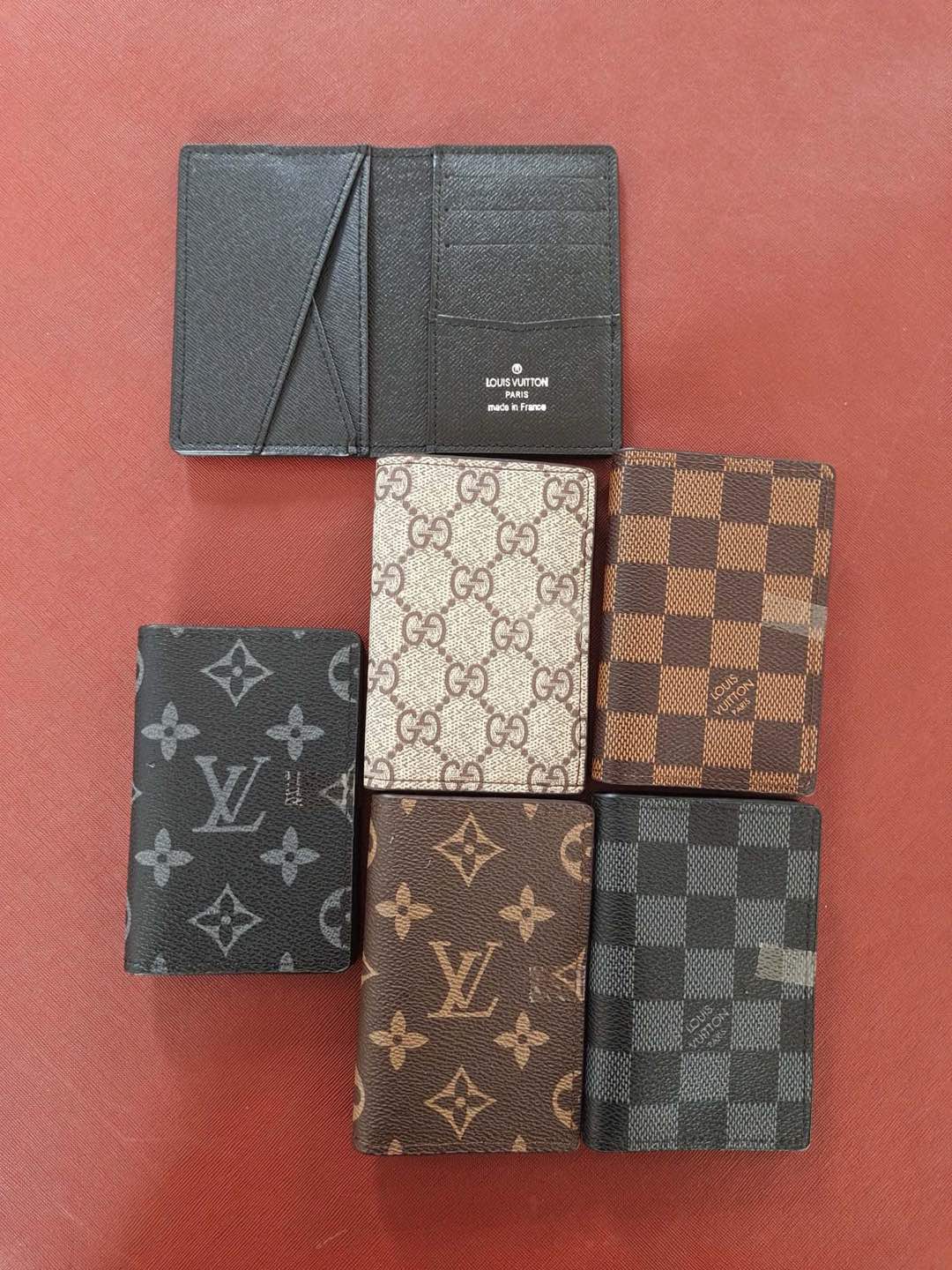 Leather card holder in use showing cards inserted