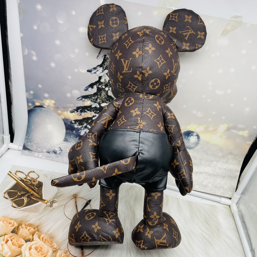 Close-up detail of the bulldog doll handbag