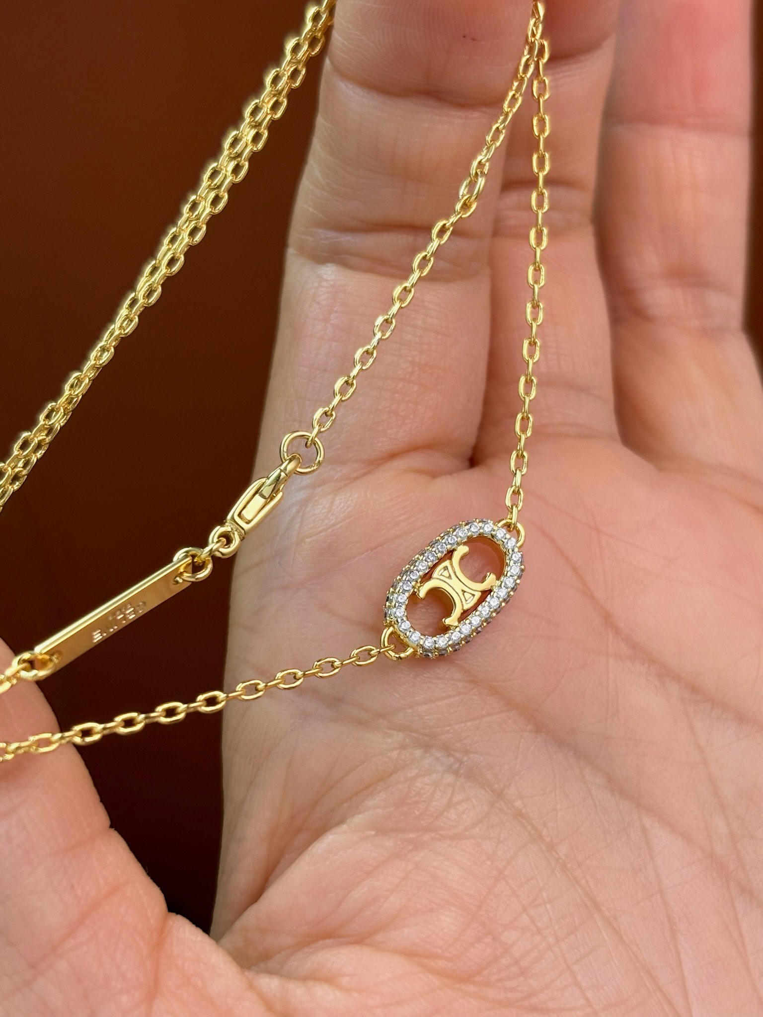 Celine Gold Finish Triomphe Necklace With Crystals - Elegant and Refined 7 i1733041225 5326 7