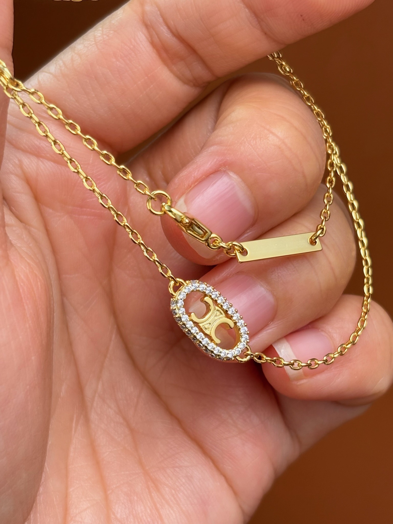 Celine Gold Finish Triomphe Necklace With Crystals - Elegant and Refined 5 i1733041225 6892 6
