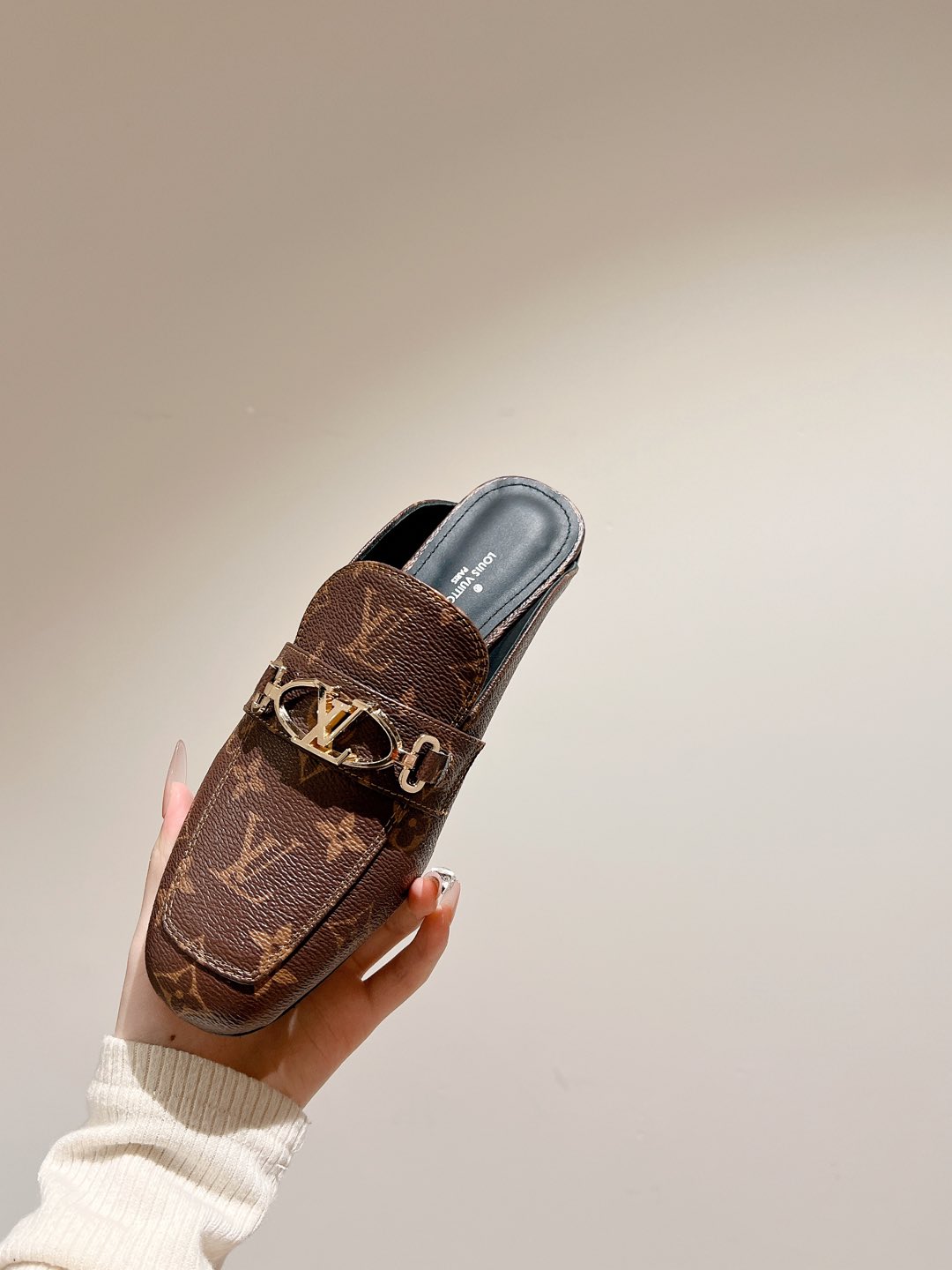 Louis Vuitton Monogram Leather Mules Iconic Style and Supreme Comfort 9 i1735070996635 209 0 6