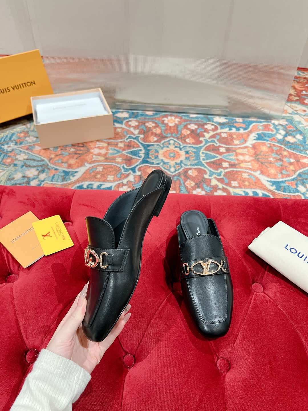 Louis Vuitton Black Leather Mule with Gold-Tone Chain Detail 3 i1735071032139 706 0 1