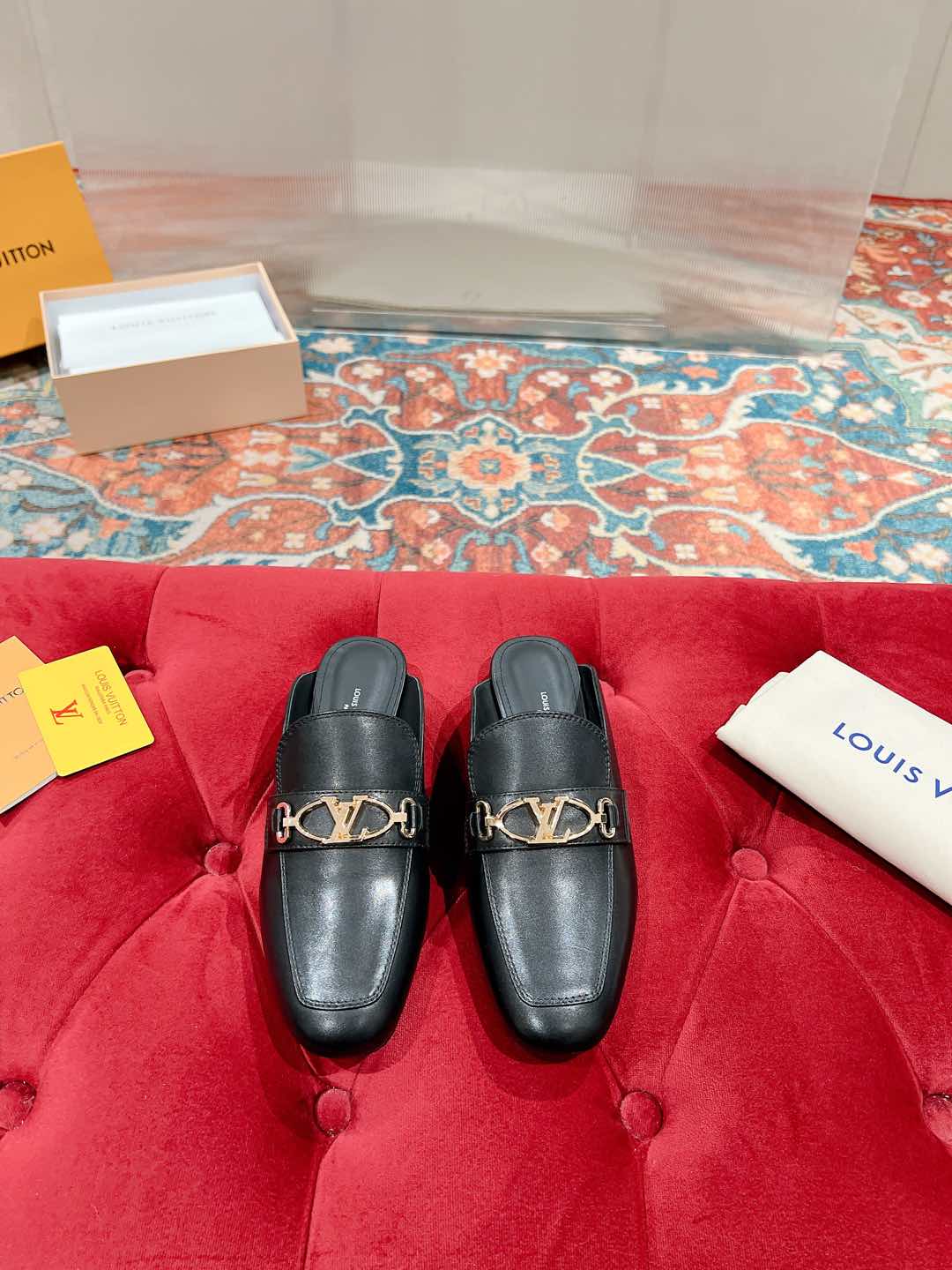 Louis Vuitton Black Leather Mule with Gold-Tone Chain Detail 4 i1735071032317 1357 0 0