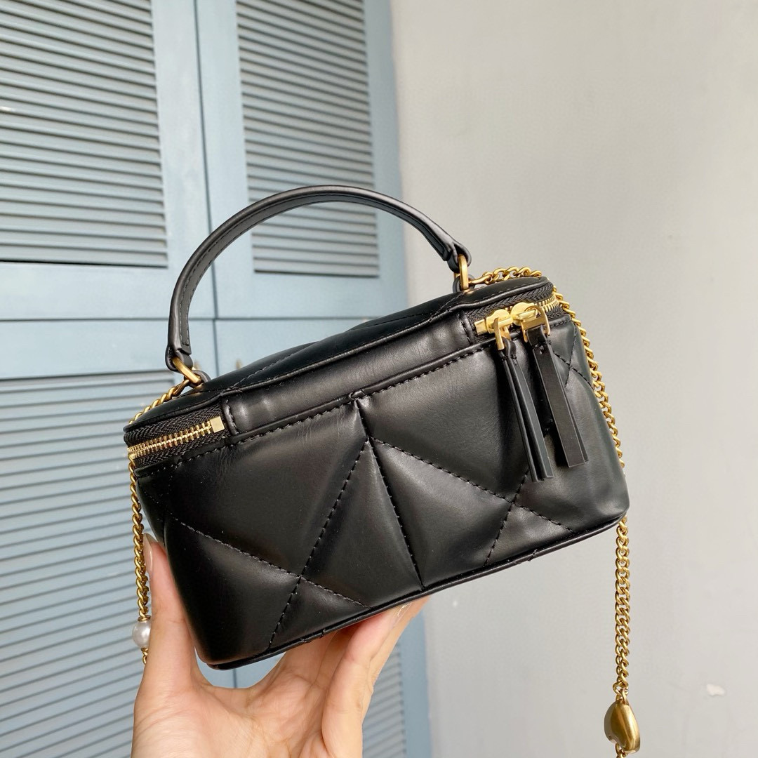 Tory Burch ～Tory Burch新款Kira化妆盒子包 牛皮材质柔软经久耐用 菱格形绗缝立体蓬松