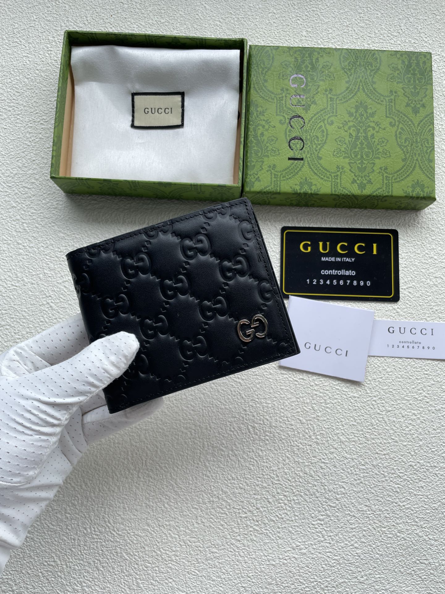 gucci #】🇮🇹短夹钱包匠心选用柔软黑色皮革制成,皮革呈现复古效果,金银属色调的互扣式双G细节 5