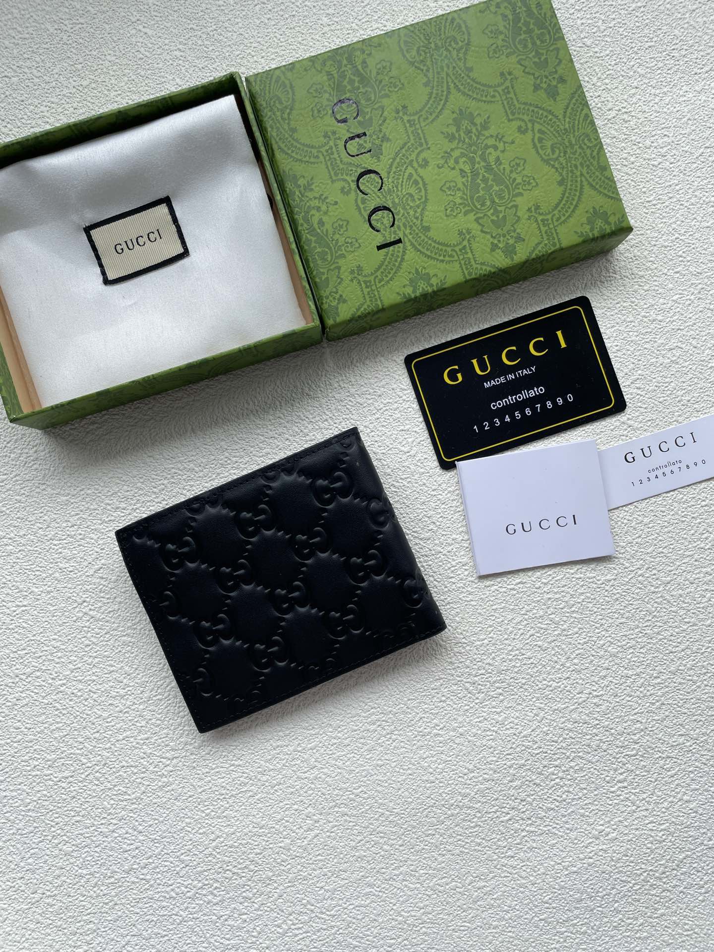 gucci #】🇮🇹短夹钱包匠心选用柔软黑色皮革制成,皮革呈现复古效果,金银属色调的互扣式双G细节 4