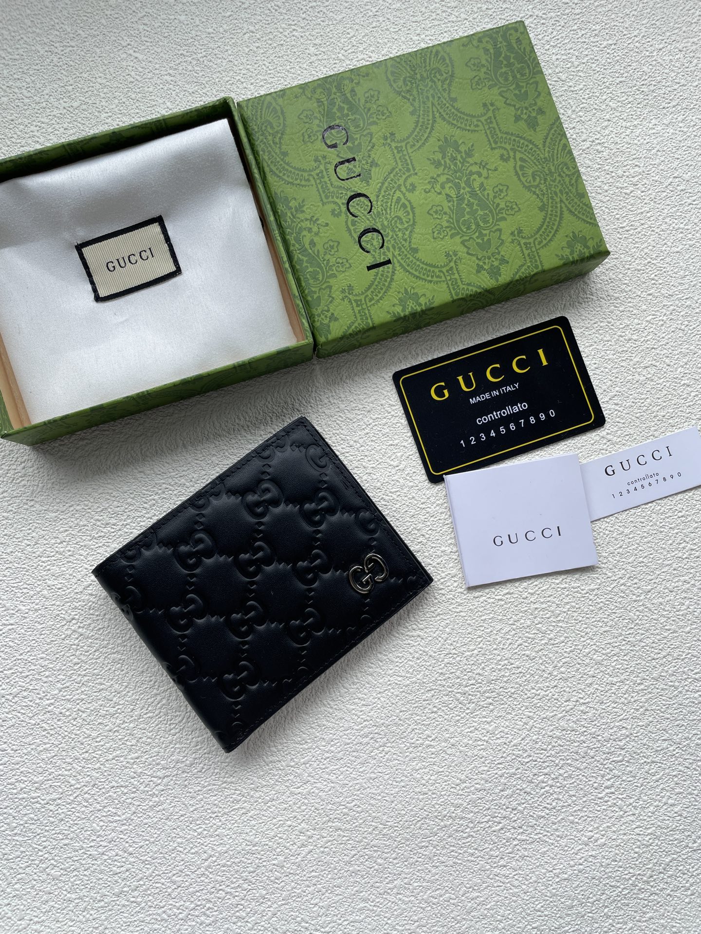 gucci #】🇮🇹短夹钱包匠心选用柔软黑色皮革制成,皮革呈现复古效果,金银属色调的互扣式双G细节 3