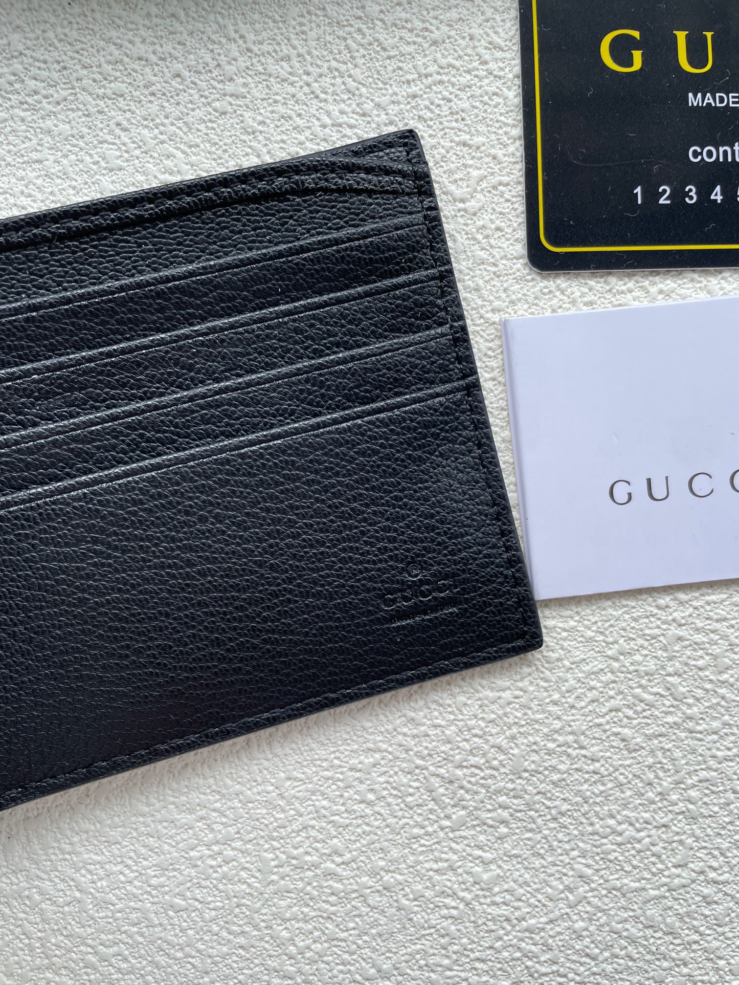 gucci #】🇮🇹短夹钱包匠心选用柔软黑色皮革制成,皮革呈现复古效果,金银属色调的互扣式双G细节 7