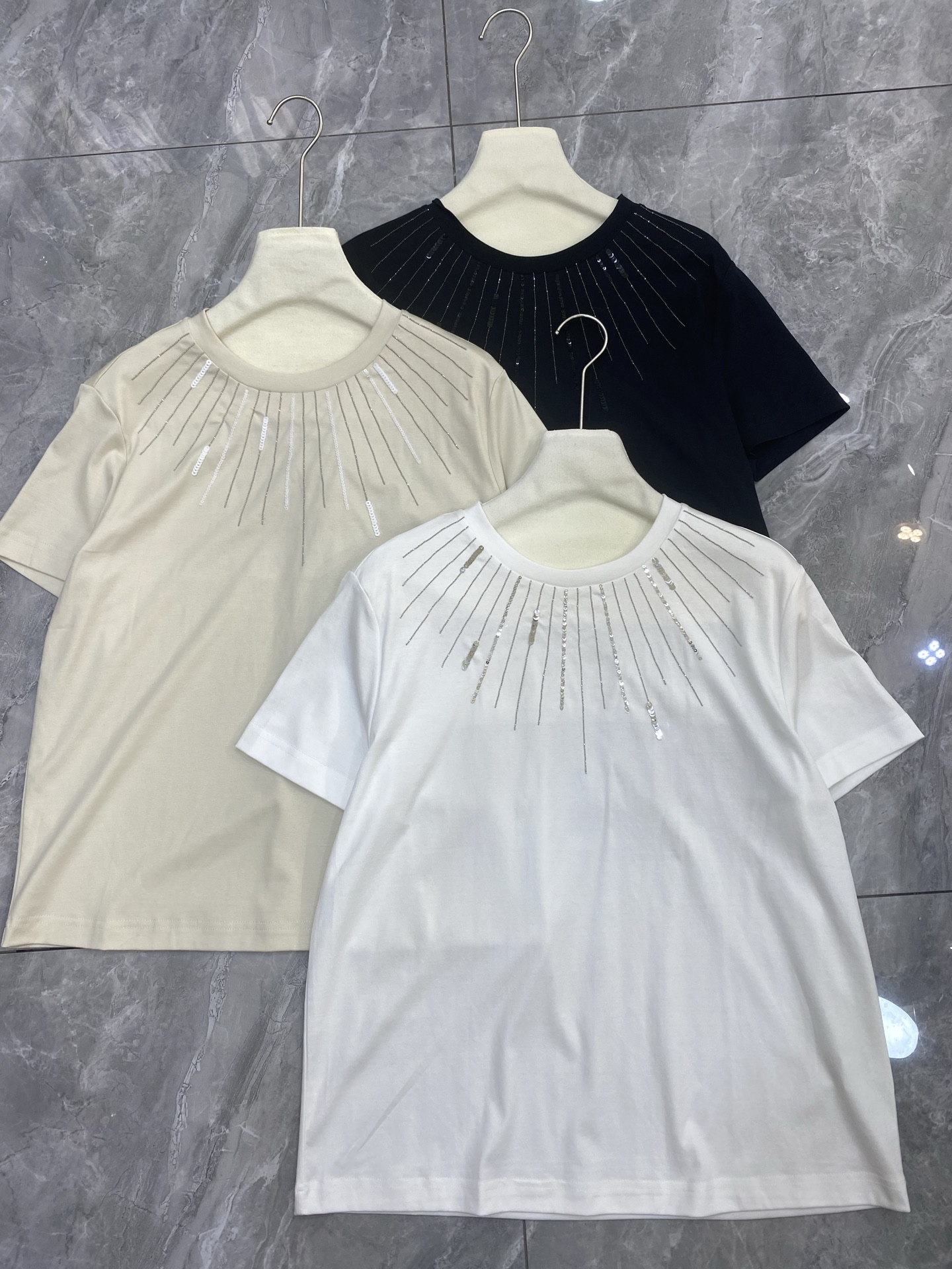 Fashionable Hard-Core Girl: Liquid Ammonia Cotton T-shirt in White, Almond, and Black