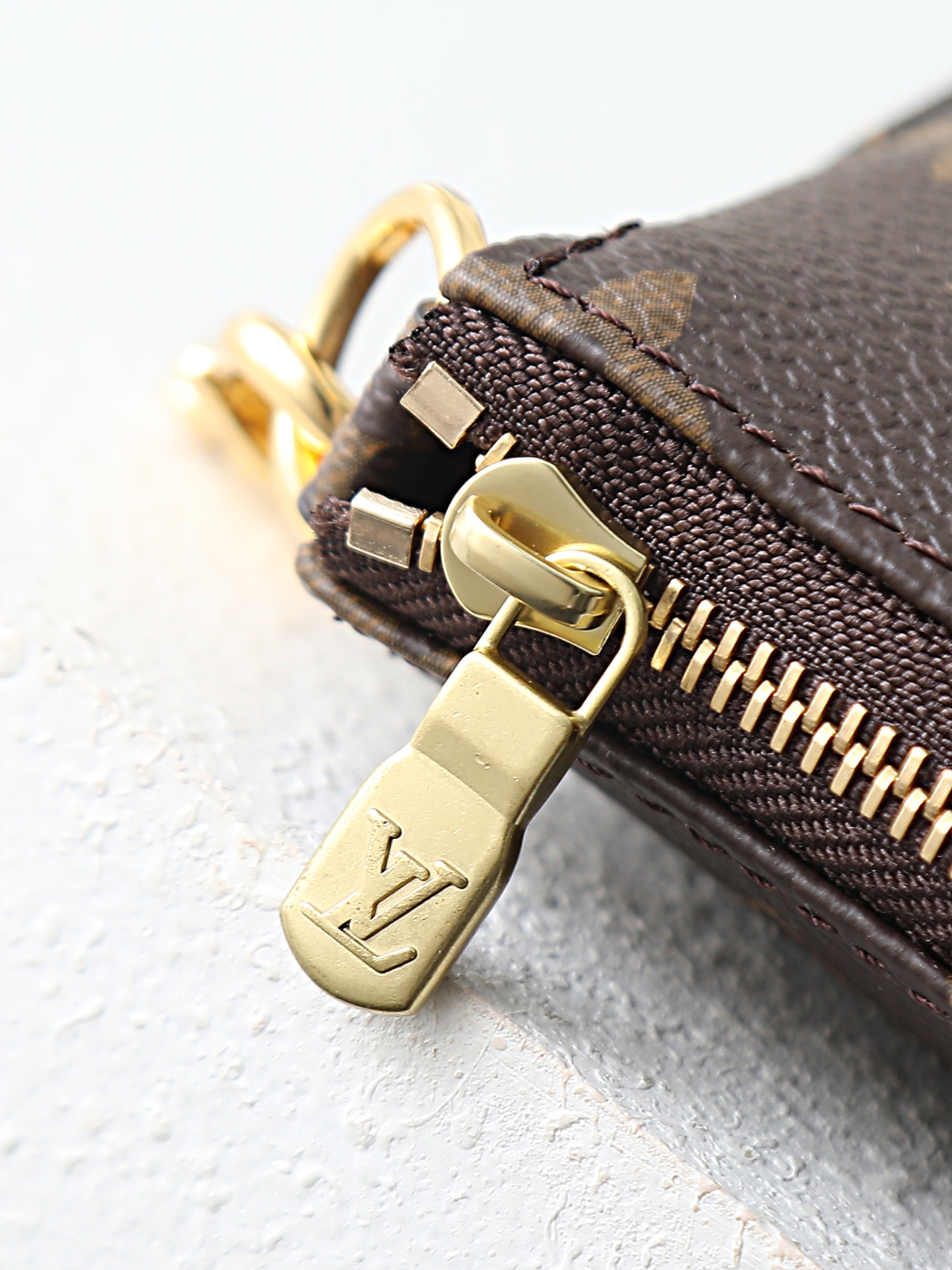 【顶级品质】 M58009 老花 本款Mini Pochette Accessoires手拿包采用柔软Monogram帆 【顶级品质】 M58009 老花 本款Mini Pochette Accessoires手拿包采用柔软Monogram帆