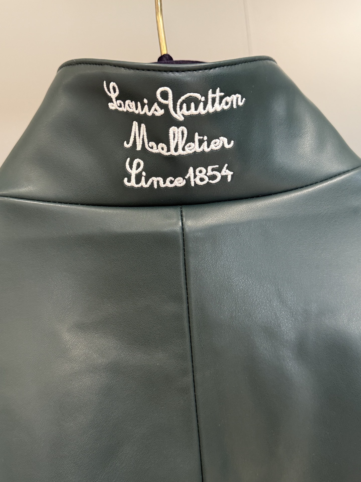 Louis Vuitton Varsity Jacket in Leather and Nylon Blend with LV Logo 9 i1760018218916 9747 0 8