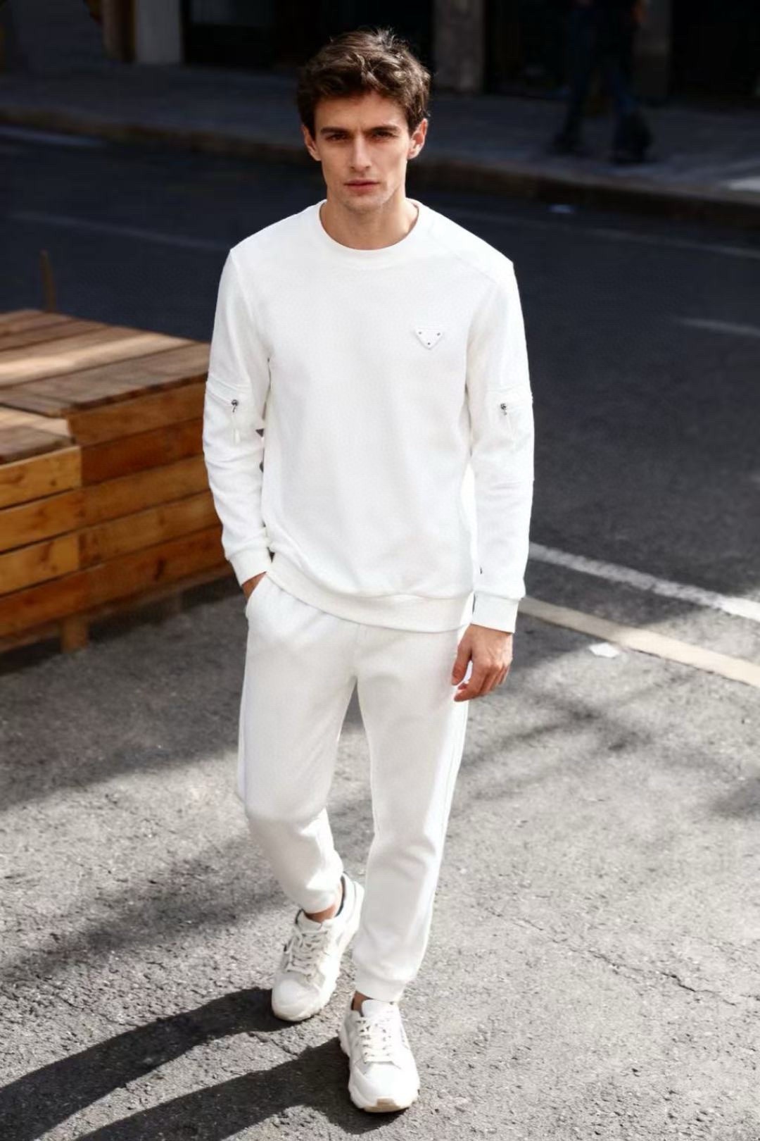 NO:599973,Pr*/Pr*da. 2025 autumn new style!  The fashionable men's round-neck sweatshirt is made of comfortable and warm fabrics. The round-neck design is simple and elegant, and there is the brand's iconic triangle logo on the chest. The overall presentation is a men's casual sweatshirt style that is both fashionable and textured. It is suitable for creating light luxury casual or urban fashion wear. A must-have item for trendy men!  Sizes 48-56, next day shipping, prada, hoodie, sweatshirts, alexander wang19860909普拉*/Pr*da. 2025秋季新款！时尚男士圆领卫衣采用舒适保暖面料,圆领设计简约大方,胸前有品牌标志性的三角徽标,整体呈现出兼具时尚与质感的男士休闲卫衣样式,适合打造轻奢休闲或都市时尚穿搭.潮男必备单品！ 尺码48-56,隔天出货,,prada,hoodie,sweatshirts,alexander wang,Men's clothing