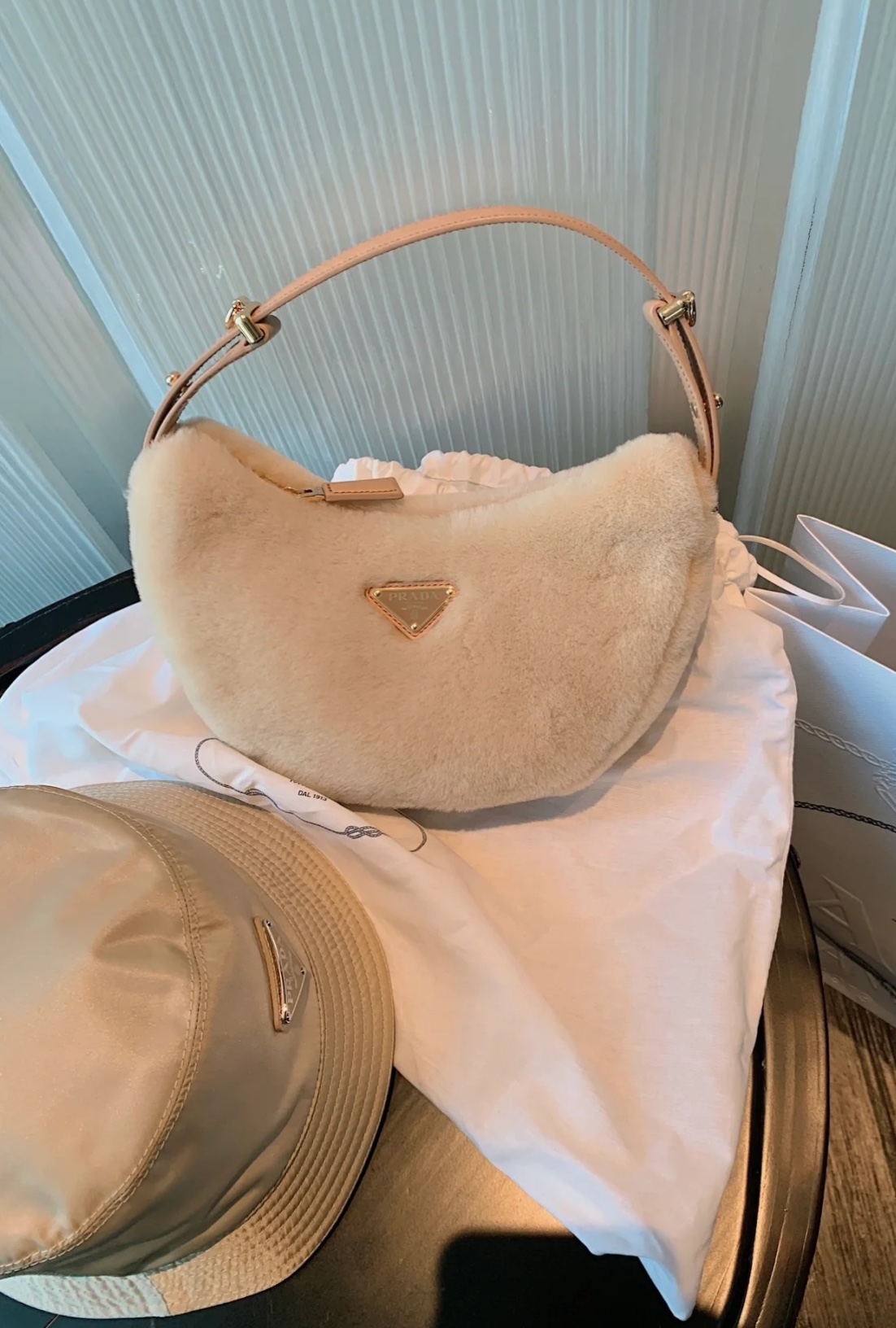 Crafted in plush shearling, this spacious bag is designed to accommodate - Comprehensive