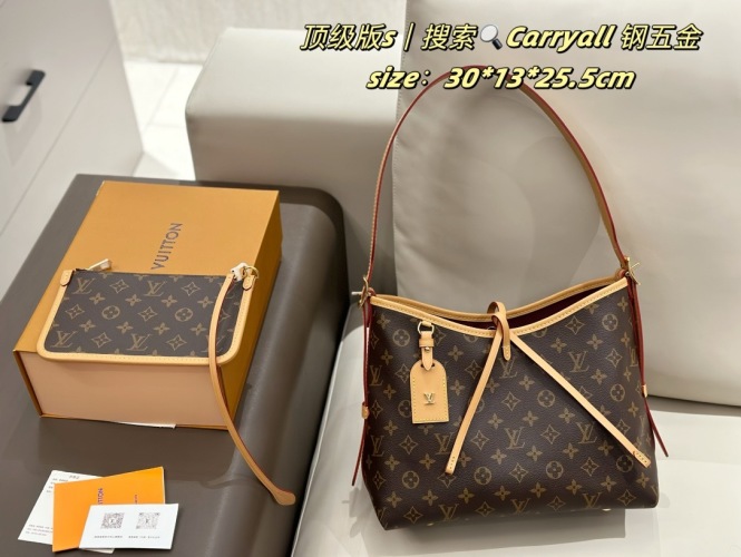 Louis Vuitton CarryAll Handbag: Top-Grain Leather, Steel Hardware, Compact Size 1 Louis Vuitton CarryAll Handbag: Top-Grain Leather, Steel Hardware, Compact Size