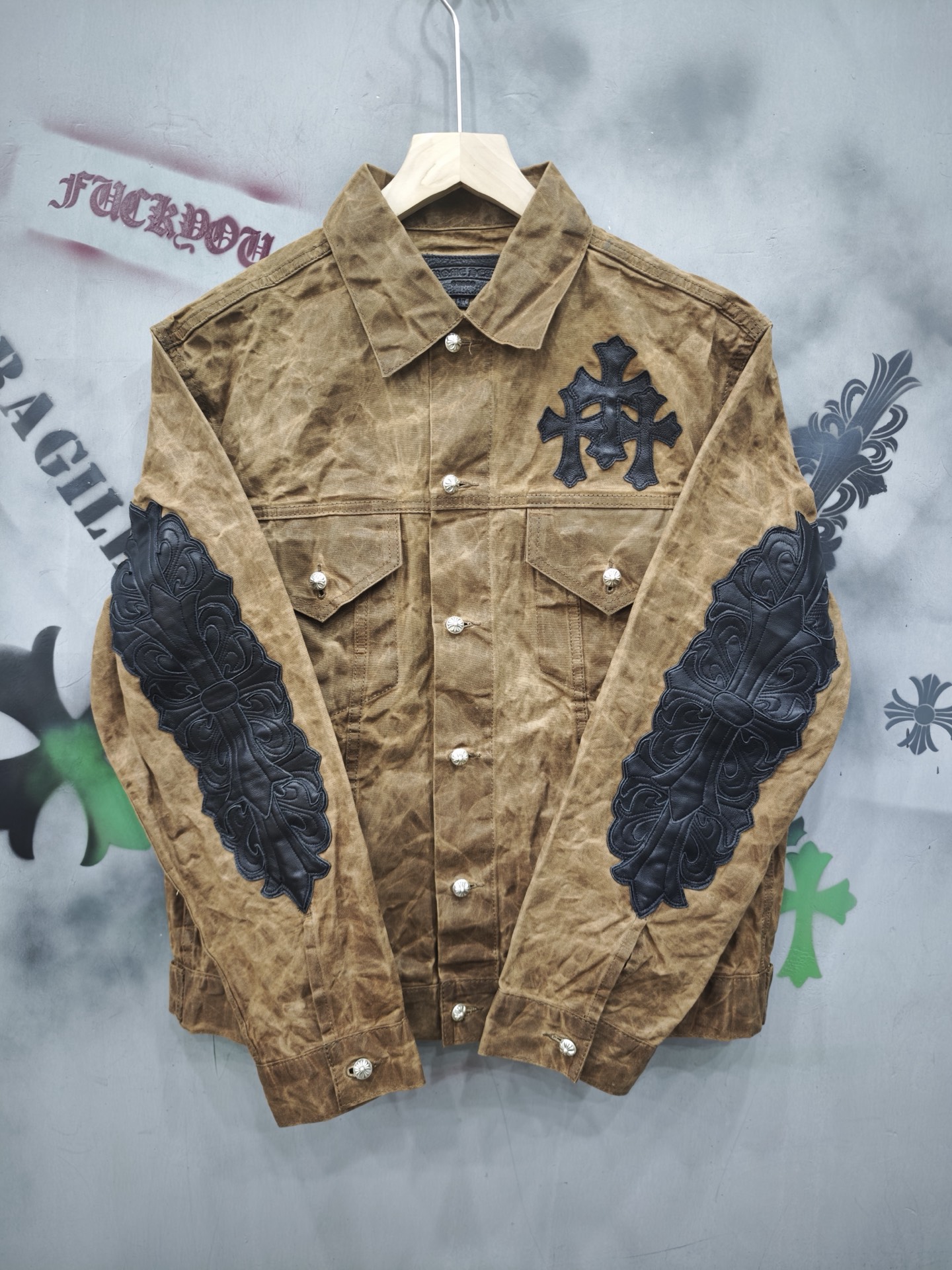 Chrome Hearts waxed canvas denim jacket with vine-embroidered leather sleeves