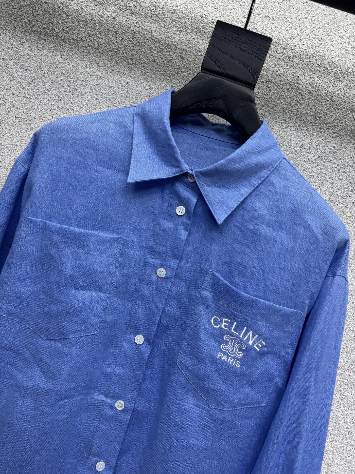 Синяя рубашка с вышивкой бренда Celine