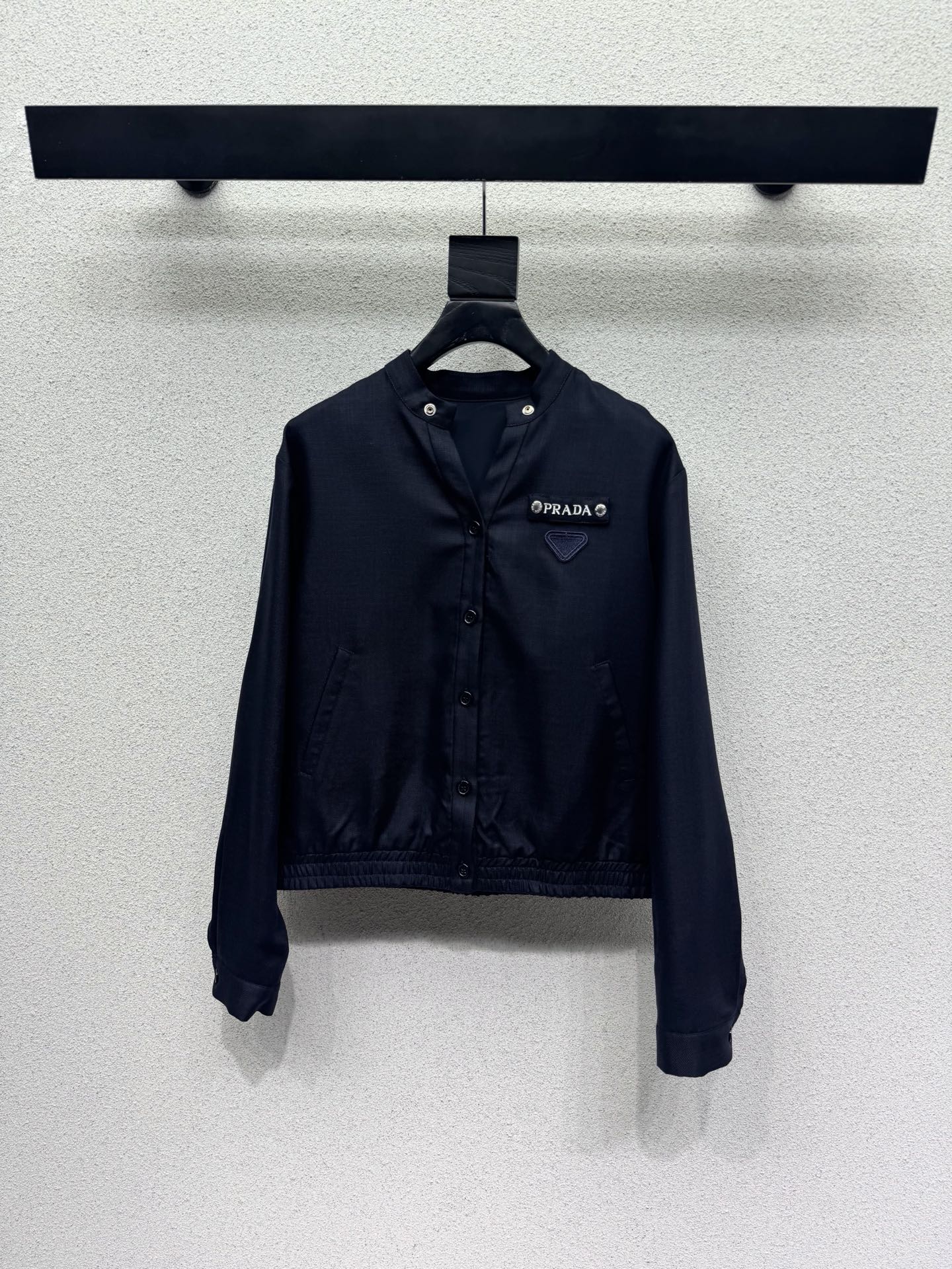 Комплект из куртки и брюк с логотипом Prada