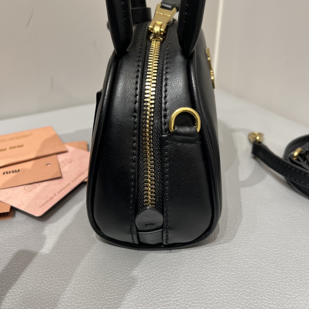 Miu Miu Miumiu half moon shell bag