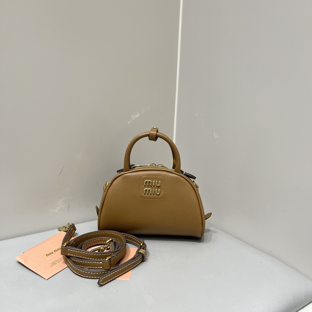 Miu Miu Miumiu half moon shell bag