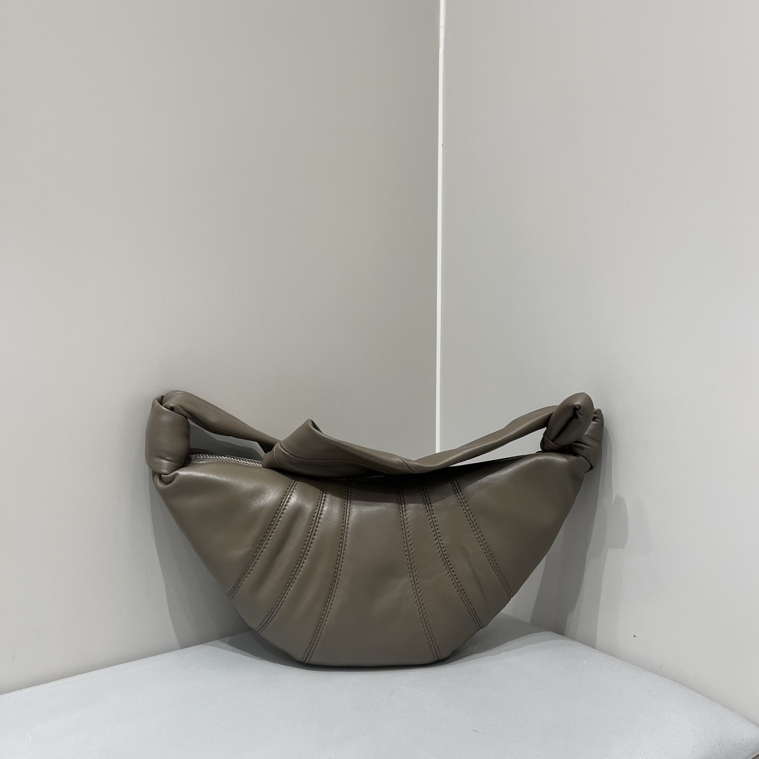 Lemaire croissant first launched in rare edition counter, cement gray