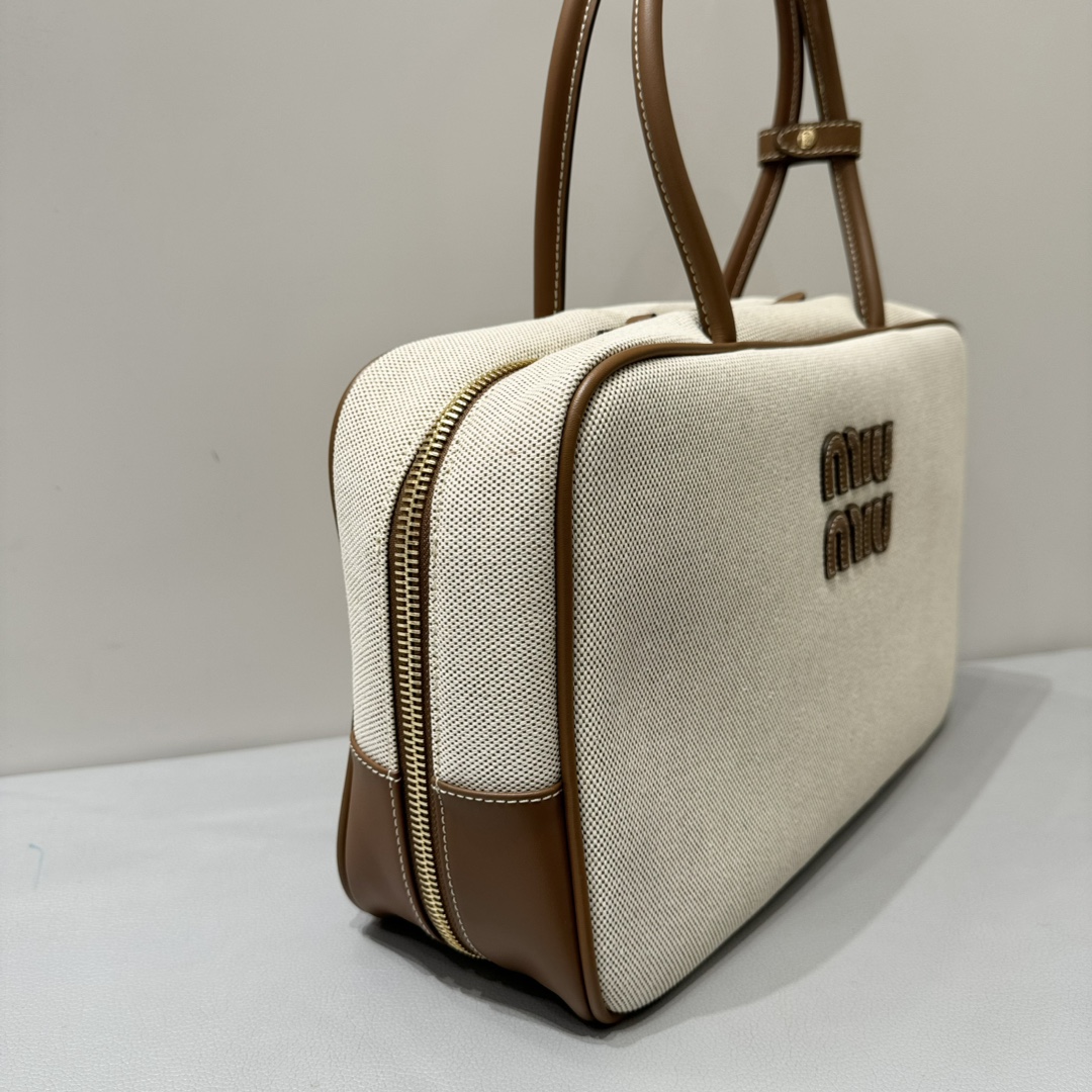 Miu Miu MiuMiu canvas briefcase