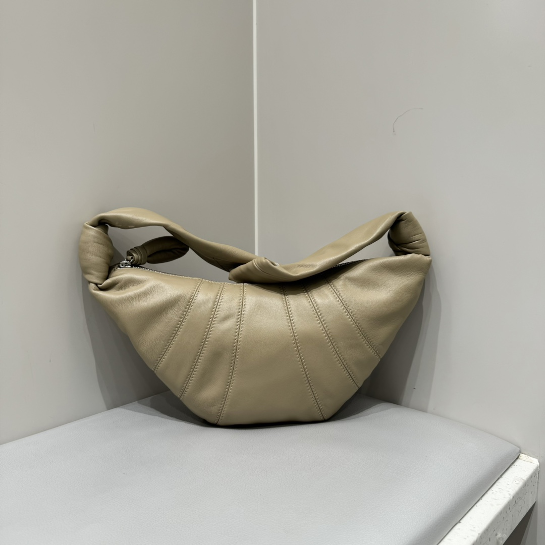 Rare edition of Lemaire croissant first launched at counter, sand dune color