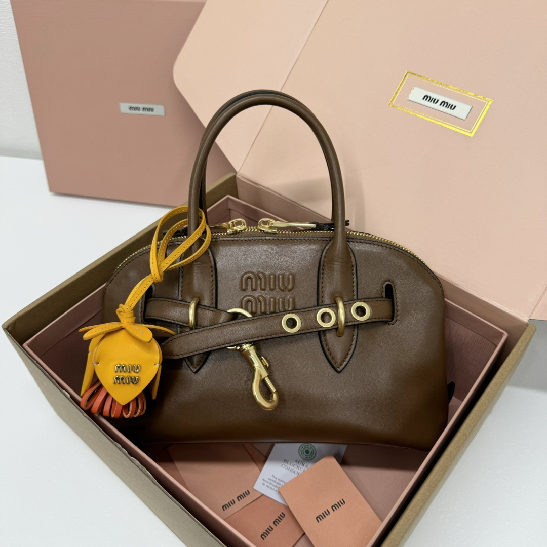 MiuMiu Perfect
 Tassen handtassen Zwart Bruin