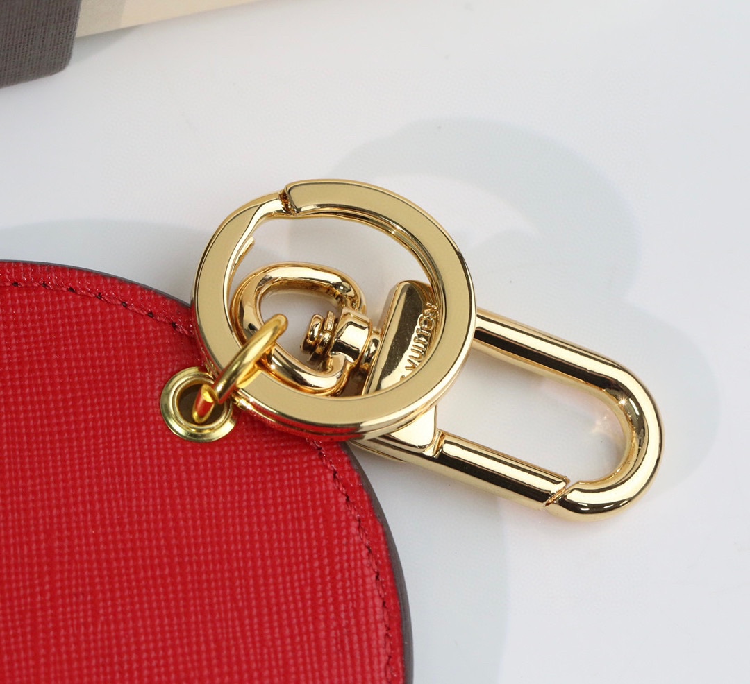 Side view of the keychain highlighting thickness and clasp.