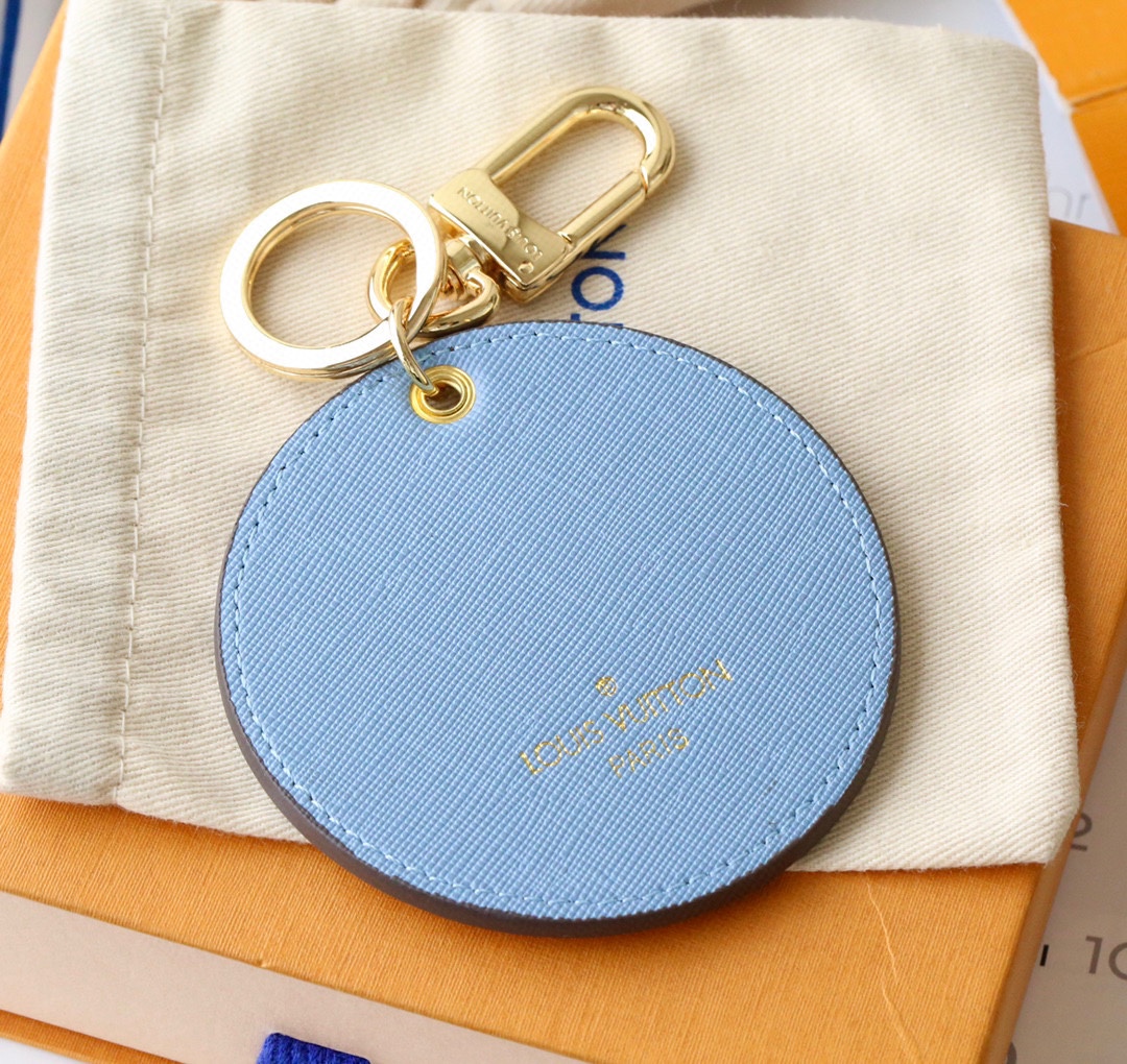 Side view of the keychain highlighting thickness and clasp.